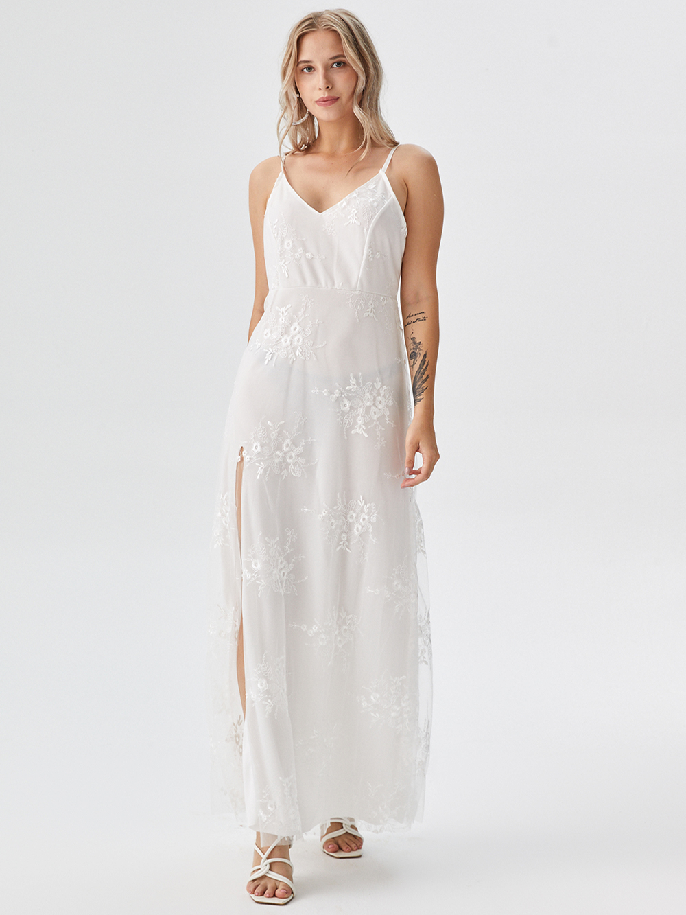 Professional AI Product Photography for Maxi Dress with Studio Model featuring Studio Model wearing Long Dress in Minimalist White Studio, Luxurious style.