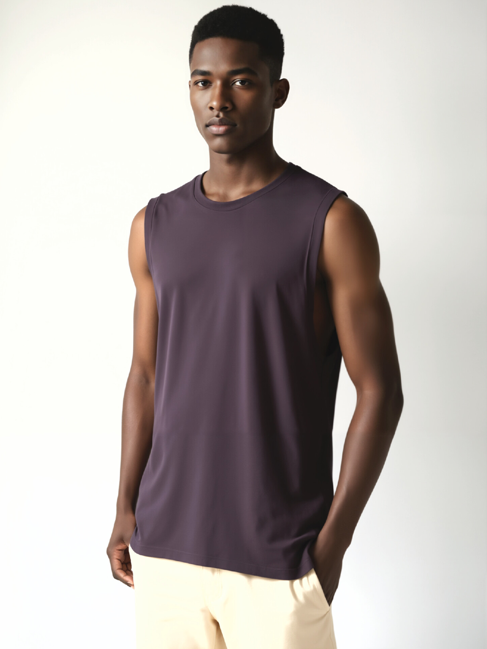 Professional Clothing Listing Image AI for Sleeveless Shirts with Black Model featuring Black Model wearing Sleeveless Shirts in Minimalist Gray Studio, Professional style.