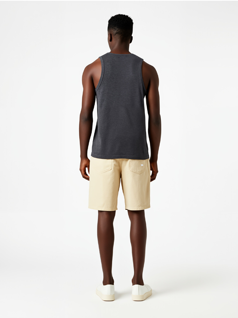 Professional Ghost Mannequin to Model for Men's Casual Outfits with Black Model featuring Black Model wearing T-Shirts & Tops in Minimalist White Studio, Professional and Minimalist style.